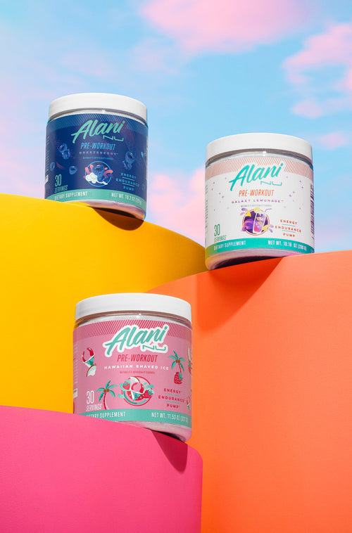 Three vibrant Alani Nu pre-workout flavors—Breezeberry, Galaxy Lemonade, and Hawaiian Shaved Ice—are showcased against a colorful, energetic backdrop, highlighting their bold and refreshing appeal.